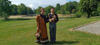 The royal couple strolling in the park